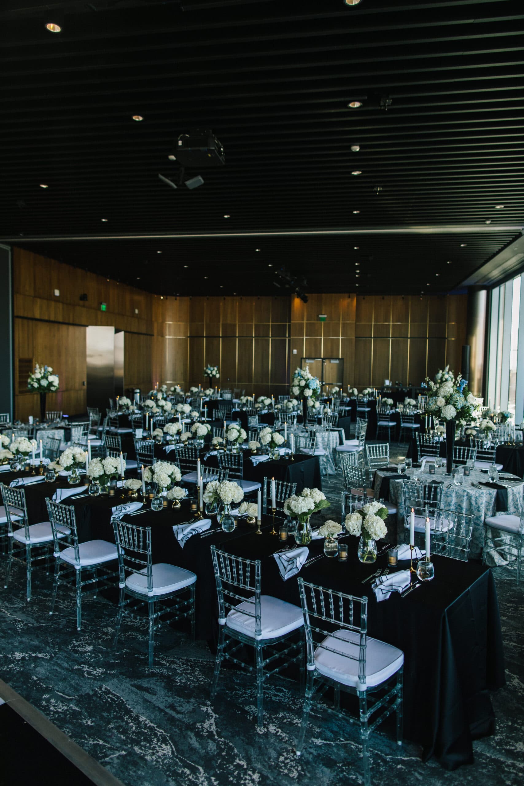 Seated dinner with chiavari chairs for wedding at Elevate at One Campus Martius